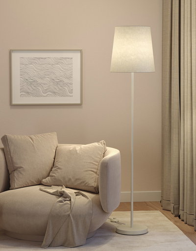 Beige vloerlamp met stoffen kap naast ronde bank en abstracte wanddecoratie in woonkamer