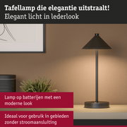 Elegante tafellamp in zwarte lederlook met modern design en draadloze batterijwerking