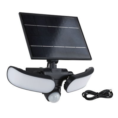 Black solar light with two white LED panels and motion sensor, includes charging cable