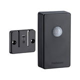Black plastic motion sensor with mounting bracket for smart lighting control
