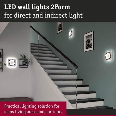 Modern LED wall lights 2Form with direct and indirect light in stairwell with grey steps