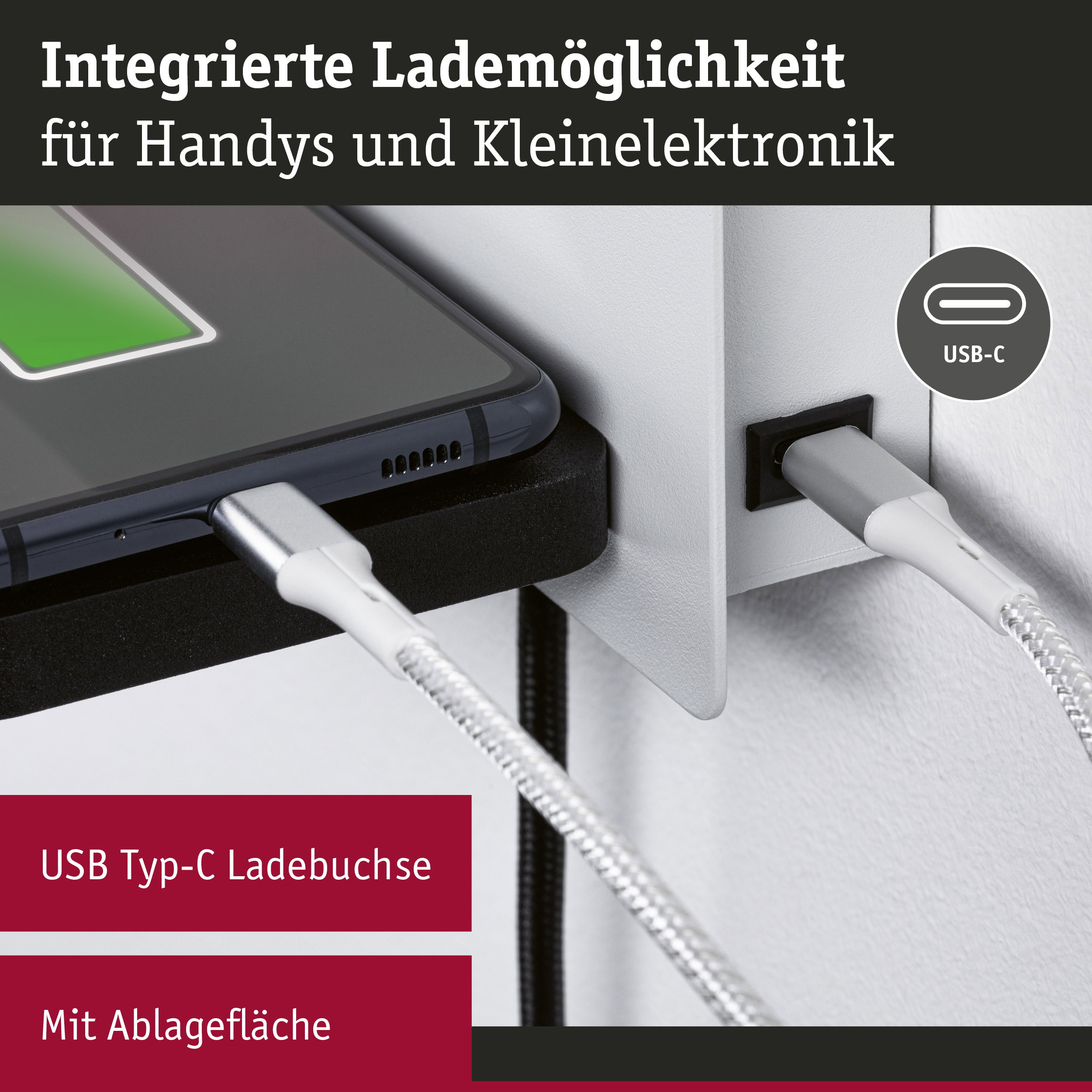 Nahaufnahme eines USB Typ-C Ladeanschlusses mit integriertem Ladekabel und Ablagefläche für Handys