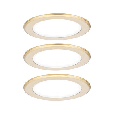 Three round gold aluminum LED recessed lights for energy-efficient room lighting