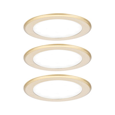 Three round gold aluminum LED recessed lights for energy-efficient room lighting