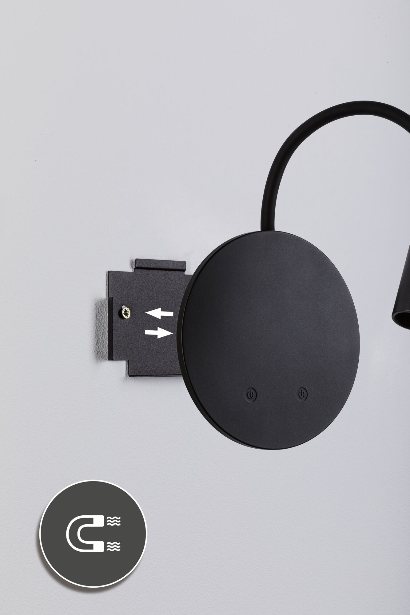 Black round metal wall lamp with flexible arm and magnetic mount for modern lighting solutions