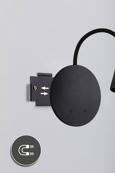 Black round metal wall lamp with flexible arm and magnetic mount for modern lighting solutions