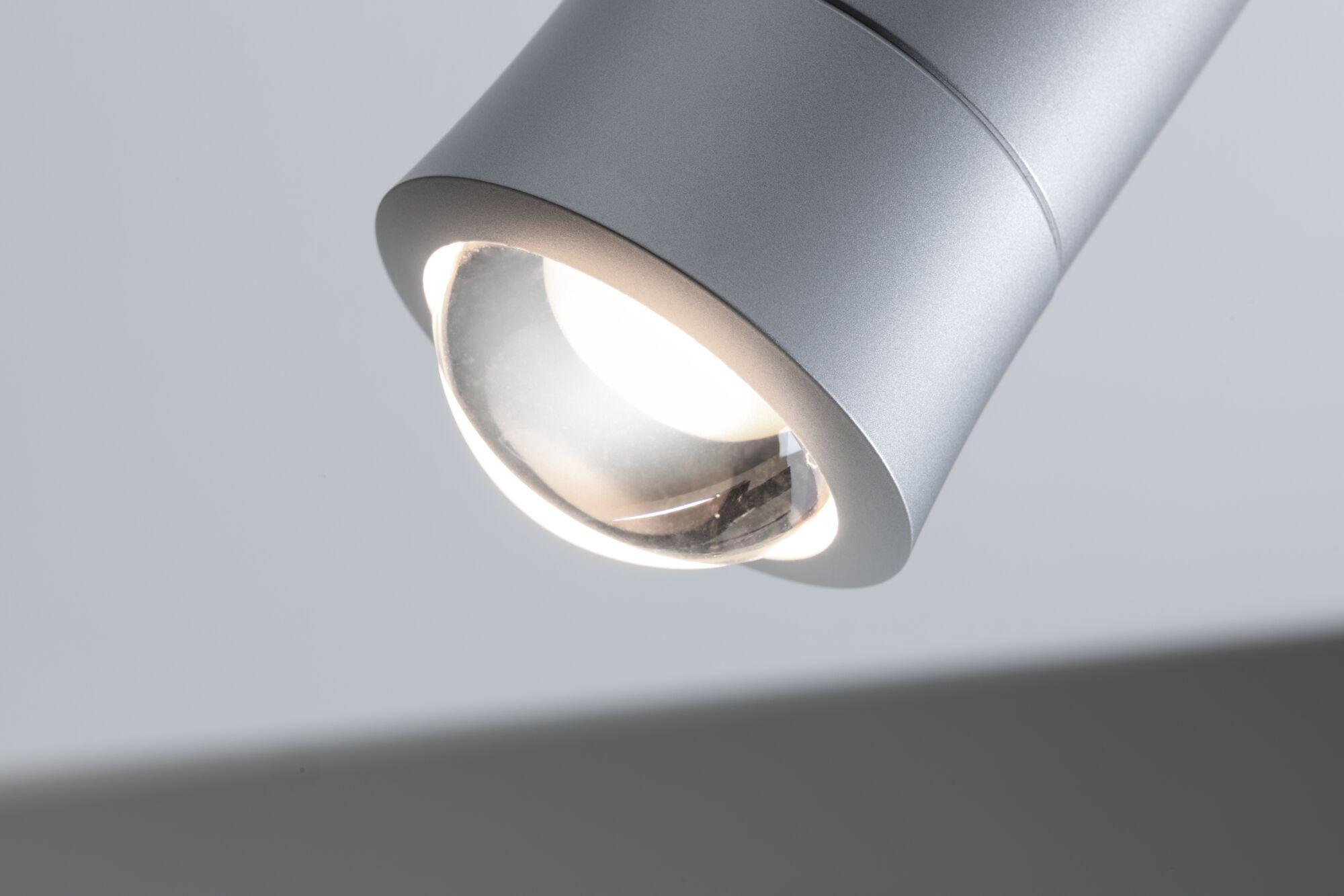 Modern silver metal LED ceiling spotlight with focused light for living spaces