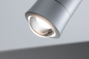 Modern silver metal LED ceiling spotlight with focused light for living spaces
