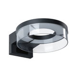 Modern black wall light with transparent acrylic ring for stylish LED indoor lighting solutions.
