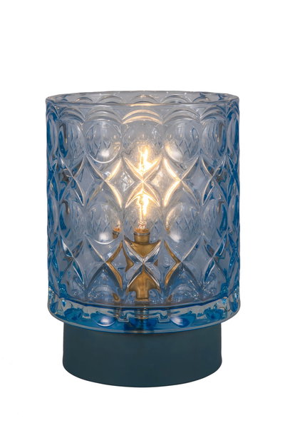 Blue patterned glass table lamp with warm white bulb on dark base for ambient home lighting