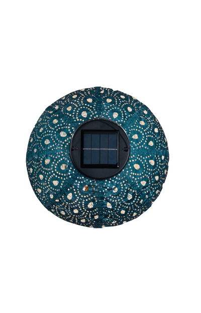 Round solar light with blue metal housing and decorative perforated design for outdoor lighting
