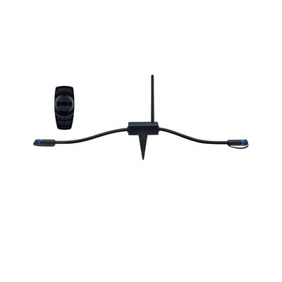 Black wireless control unit with antenna and remote for outdoor LED lighting systems