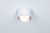 Round white metal recessed spotlight with warm white light for modern indoor lighting