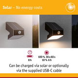 Black solar wall light with motion sensor, 8-hour charge, USB-C cable included, energy-saving outdoor lighting