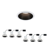 White LED recessed spotlights with black metal inner ring, energy-efficient ceiling lighting.
