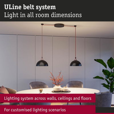 ULine Belt System with black pendant lights over white dining table in modern room with grey chairs