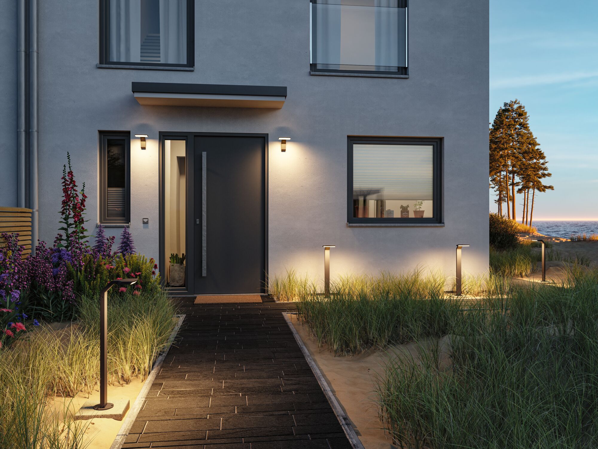 Moderne Außenbeleuchtung mit schwarzen LED-Wegeleuchten und Wandlampen an grauem Haus mit Gartenweg.