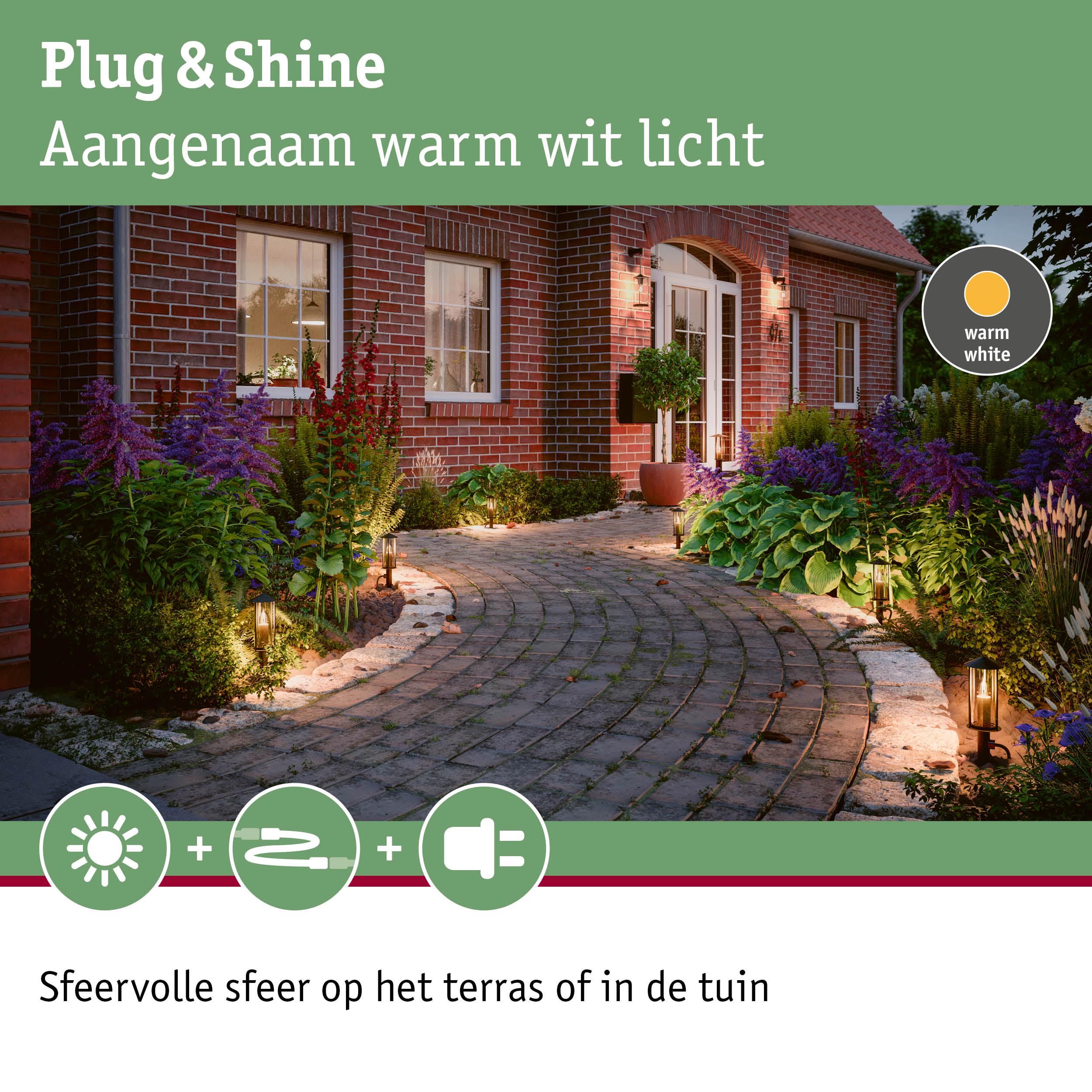 Warm wit tuinpadverlichting langs bakstenen huis voor sfeervolle buitenverlichting met LED-licht