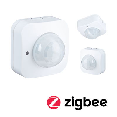 White Zigbee motion sensor with dome-shaped detector for smart home lighting control.