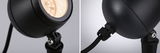 Black metal LED outdoor spotlight with adjustable head and weatherproof cable connection for garden lighting