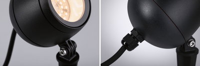 Zwarte metalen LED-buitenstraalspot met verstelbare kop en waterdichte kabelverbinding voor tuinverlichting