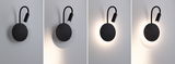 Black LED wall light with flexible reading arm and warm white light for modern interiors