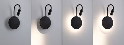 Black LED wall light with flexible reading arm and warm white light for modern interiors