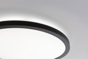 Black round LED ceiling light with white illumination and modern design for living spaces