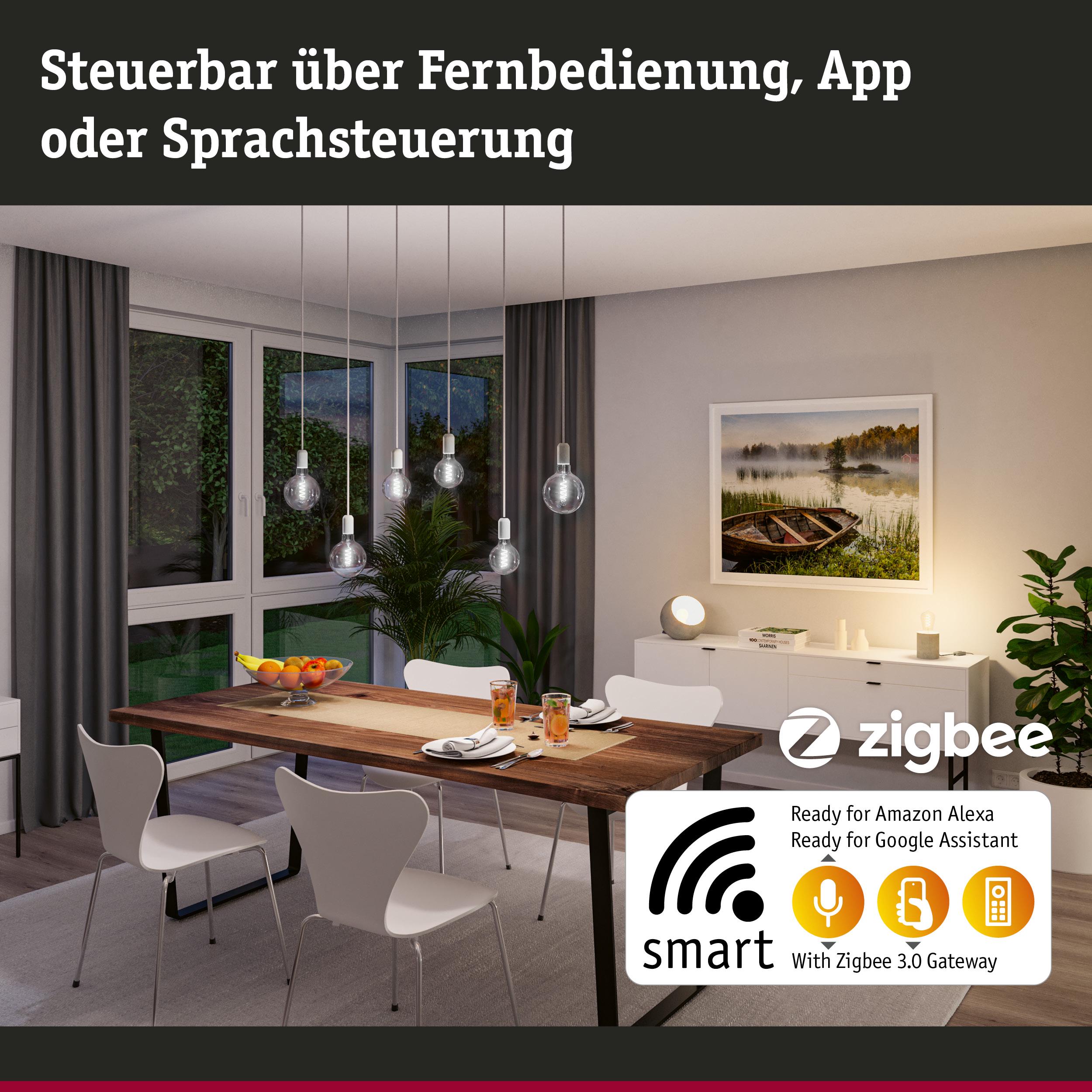 Modernes Esszimmer mit smarten Zigbee 3.0 LED-Glühbirnen in klarer Glasoptik und Holz-Tisch