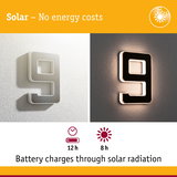 Solar-powered house number 9 in silver and black metal with LED lighting and rechargeable battery.