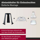 Schwarzer Abstandshalter aus Kunststoff für Einbauleuchten mit weißem Einbaurahmen und LED-Reflektoren