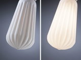 White ribbed glass lampshade set, matte and lit, for modern LED lighting fixtures.