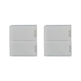 Two white plastic connectors with plus and minus symbols for LED lighting systems