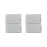 Two white plastic connectors with plus and minus symbols for LED lighting systems