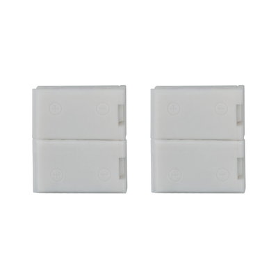 Two white plastic connectors with plus and minus symbols for LED lighting systems