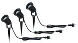 Three black LED garden spotlights with ground spikes and cables for outdoor lighting and garden decor.