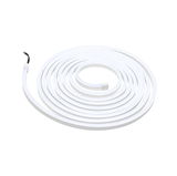 White flexible LED strip coiled with cable for modern ambient lighting solutions