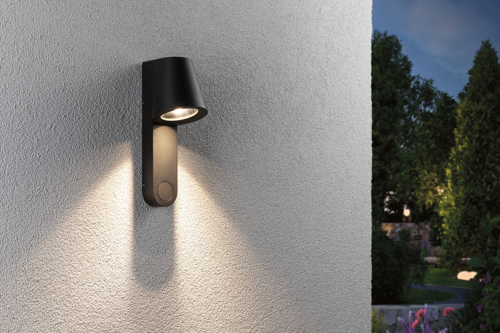 Black metal outdoor wall light with warm white LED for garden and terrace lighting.