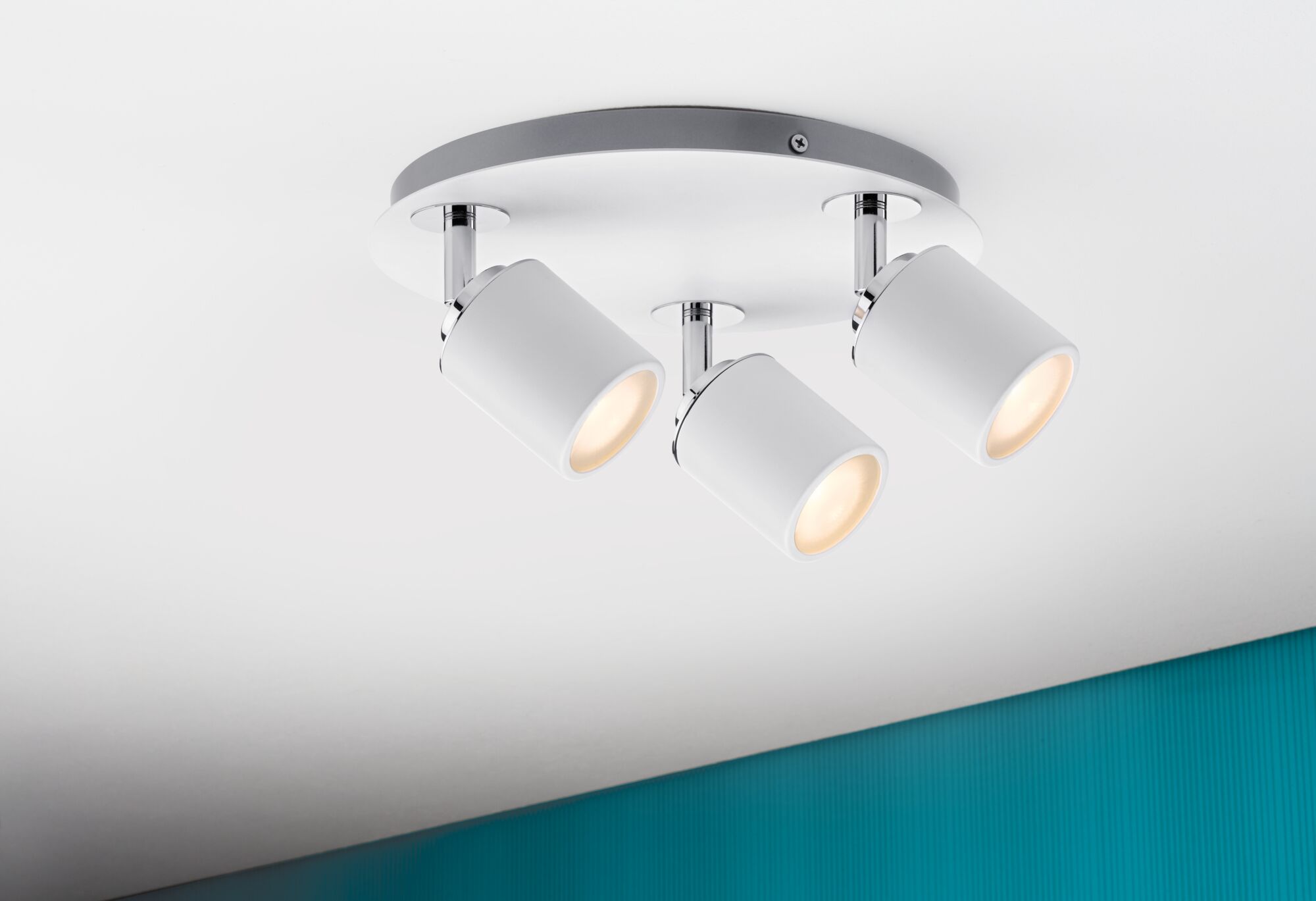 Ceiling spotlight with three white metal lamps and chrome details for modern room lighting
