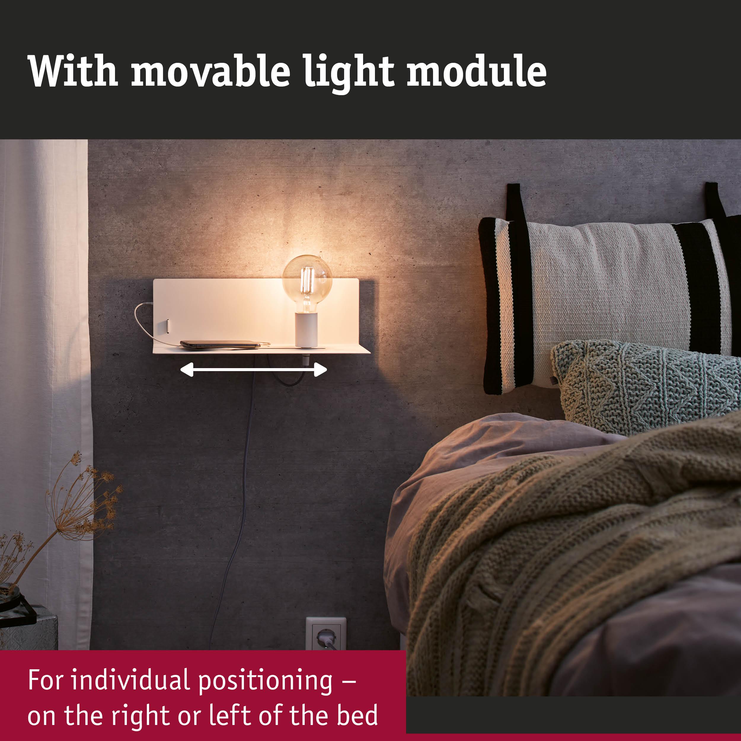 White wall lamp with movable light module and shelf beside bed with grey wall and knitted blanket
