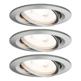 Three round recessed spotlights in brushed silver aluminum with warm white light for living spaces
