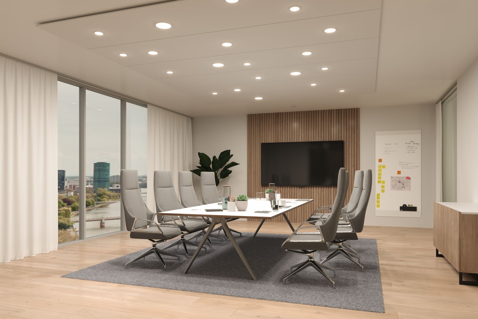 Modern conference room with grey office chairs and white table on grey carpet, LED ceiling lights