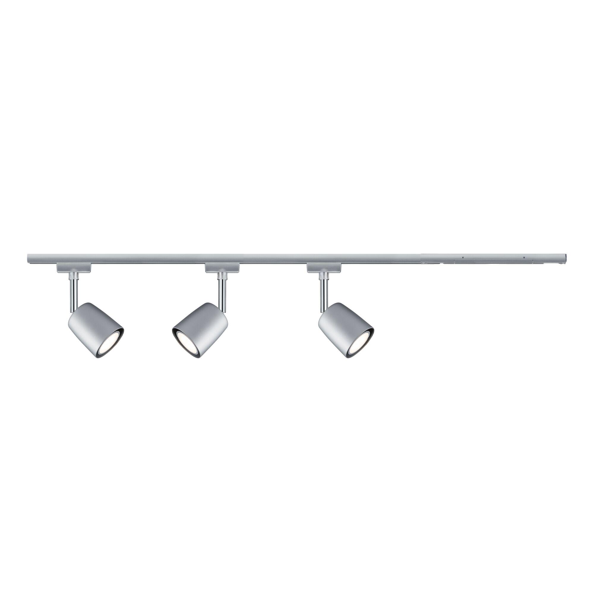 Three silver metal LED spotlights on rail for modern indoor lighting solutions