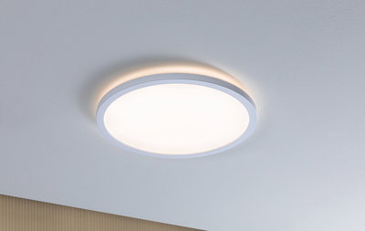 Round white LED ceiling light with warm white glow and modern design for living spaces