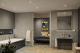 Salle de bain moderne avec carrelage gris, baignoire, lavabo et éclairage encastré pour ambiance intérieure.