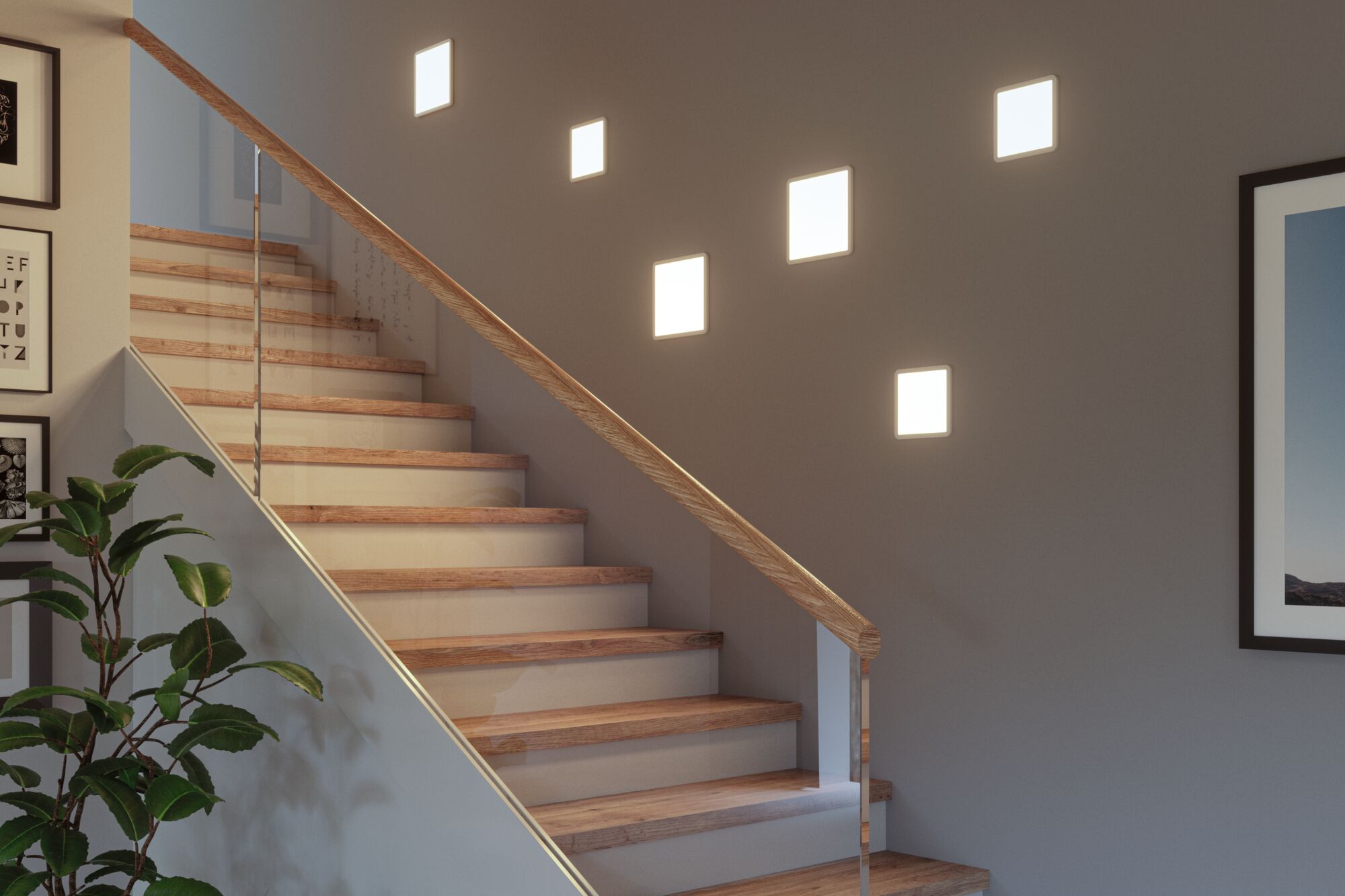 Modern staircase with wooden steps and glass railing, illuminated by square warm white wall lights.