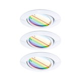 Three white recessed spotlights with adjustable rainbow-colored glass for modern LED ceiling lighting