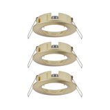 Three round brushed brass recessed frames for LED spots, energy-efficient lighting fixtures