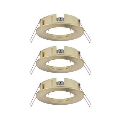 Three round brushed brass recessed frames for LED spots, energy-efficient lighting fixtures