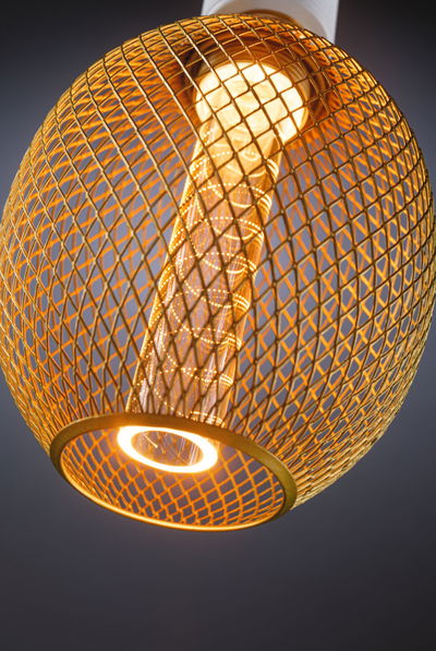 Gold metal cage pendant light with warm white LED and decorative inner cylinder for modern lighting
